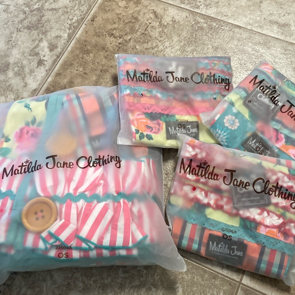 New in bags.  Matilda Jane tree skirt and 3 stocking